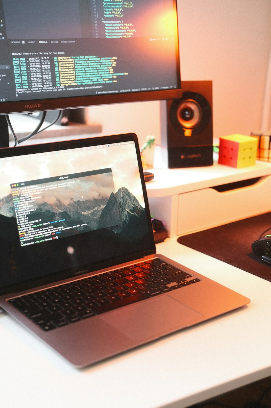 coding on laptop at desk