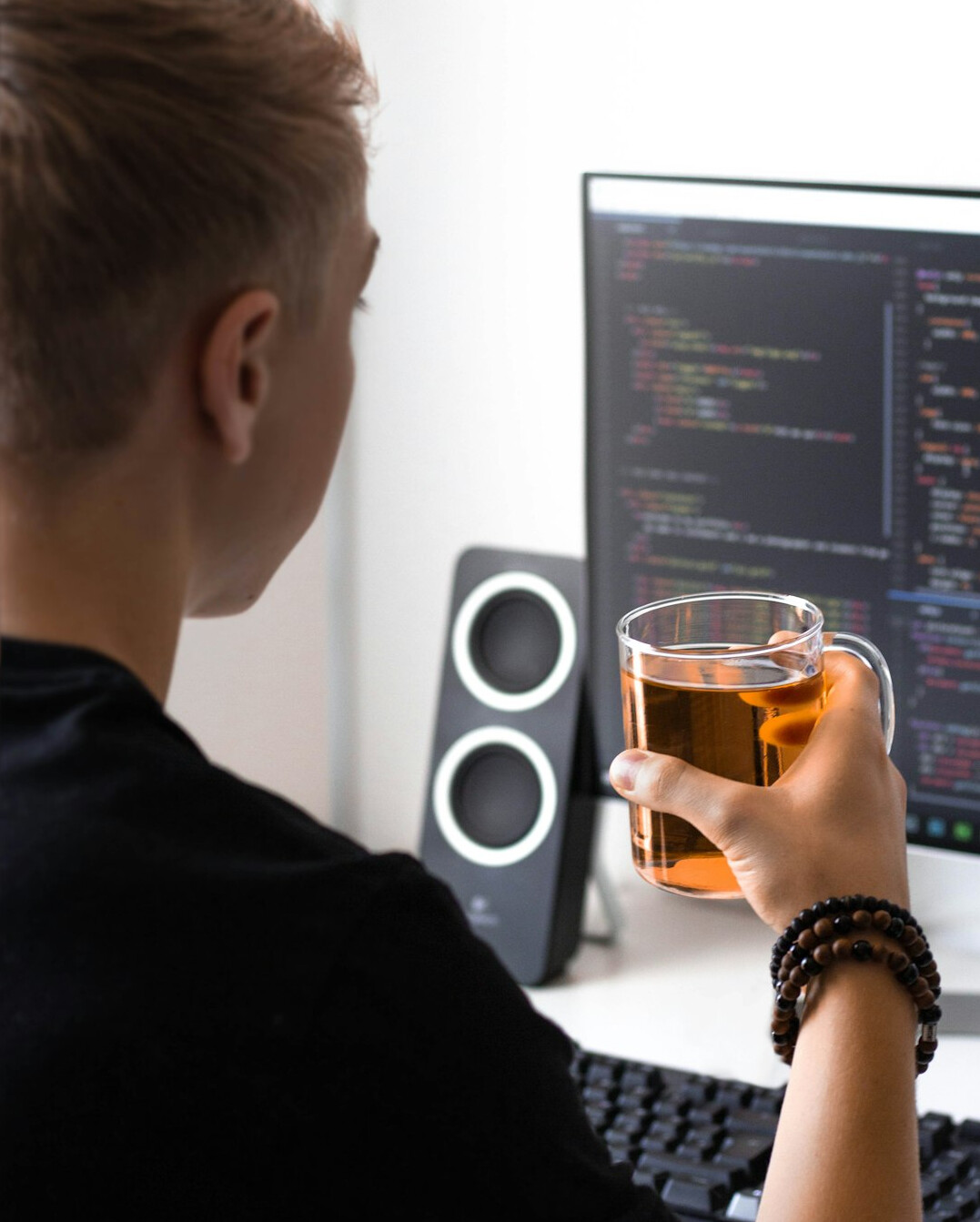 person celebrating coding success